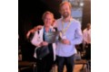 La Dra. Sara Heili y Daniel Oliva sostienen el diploma de finalista en el AI for Good Global Summit 2026 para Emily.AI