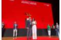 Marta del Olmo en el momento de recoger el premio